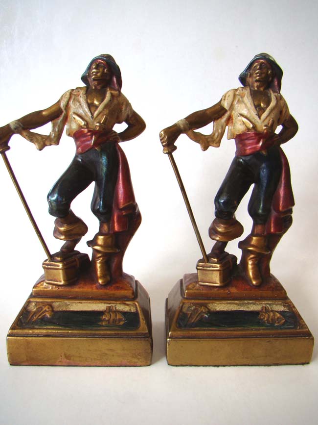 A fine and rare pair of hand painted Pirate Bookends by the Pompeian Bronze Company circa 1925
